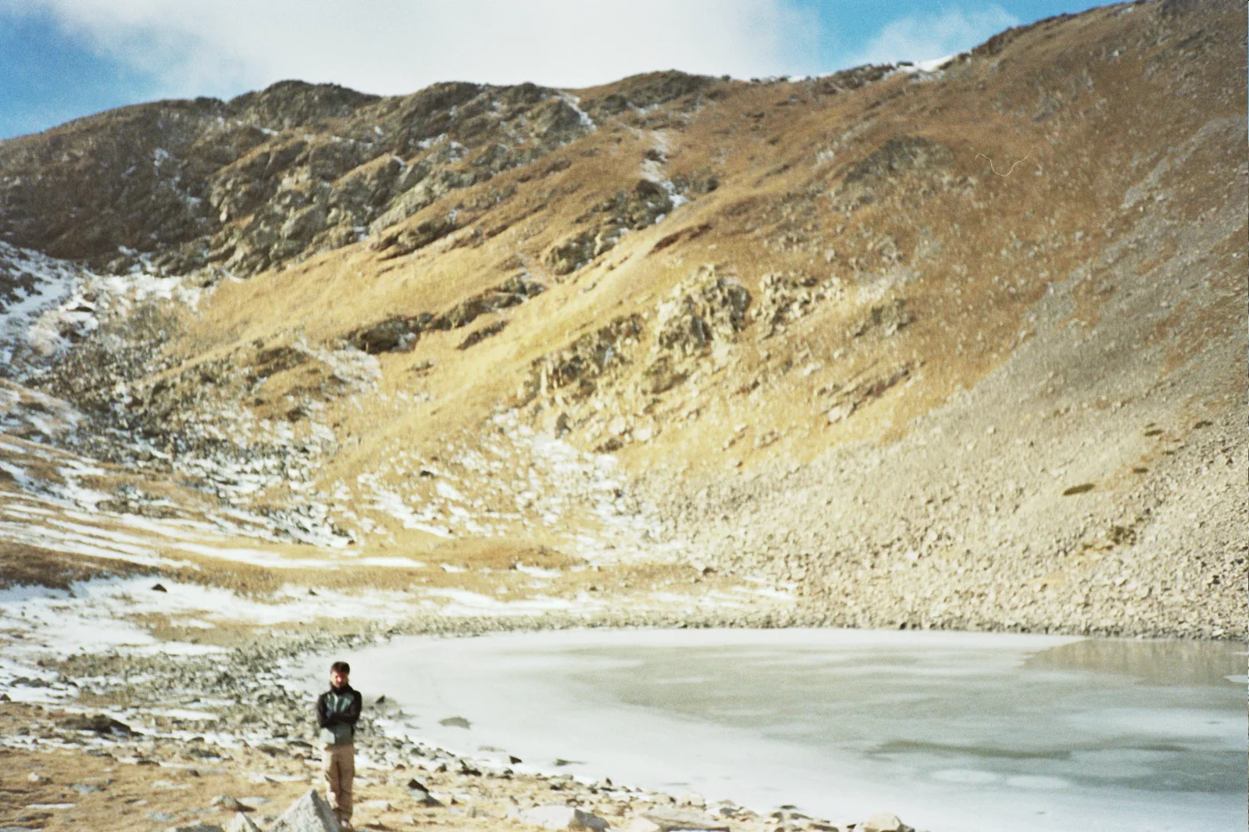 By a frozen alpine lake